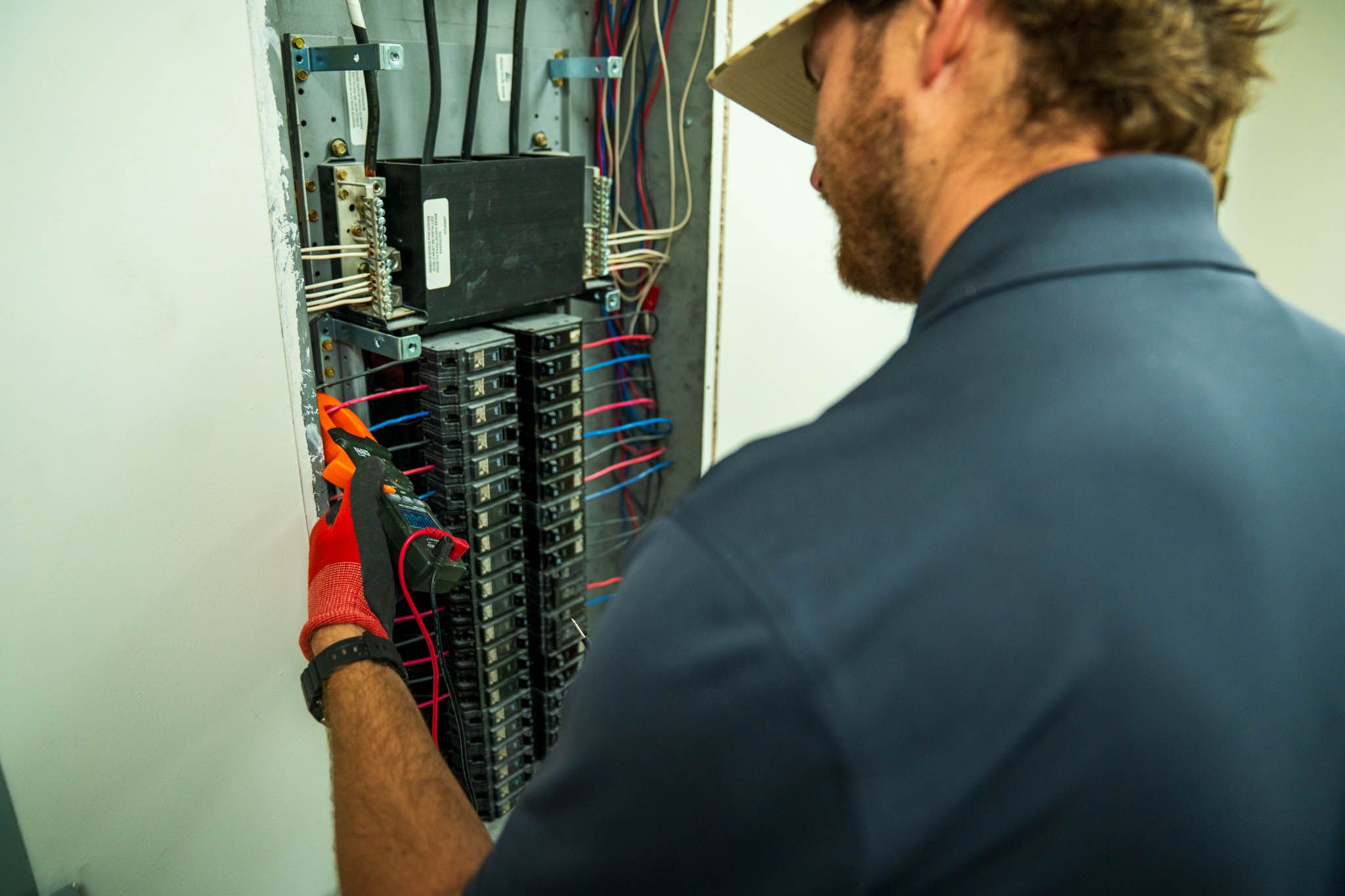 Overloaded circuit showing multiple breakers in an electrical panel