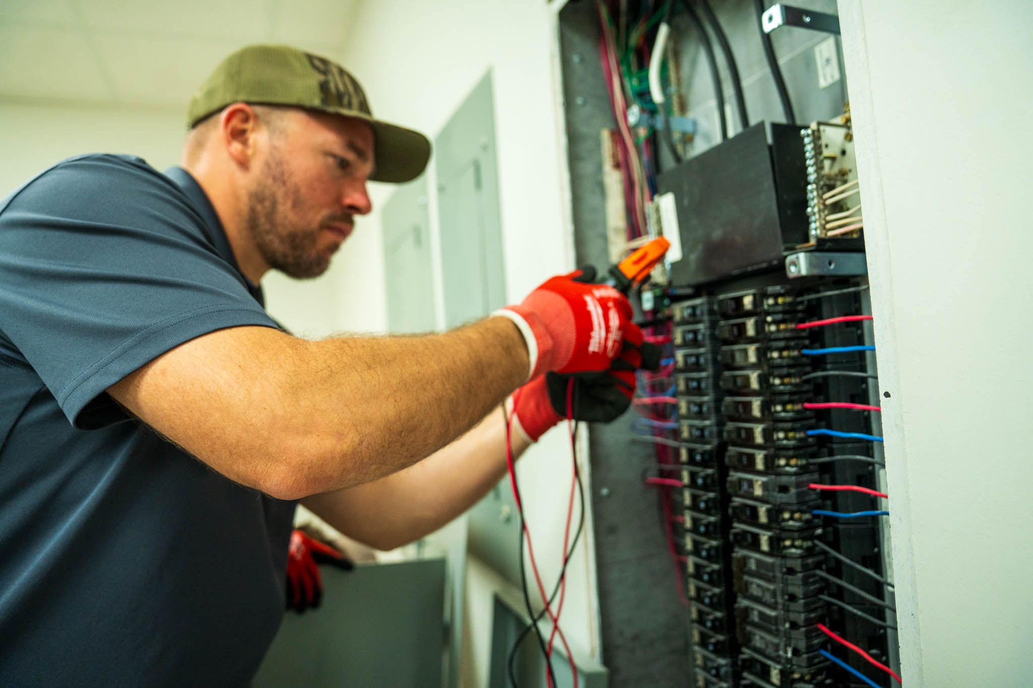 Signs of a bad circuit breaker showing damaged and burned breakers