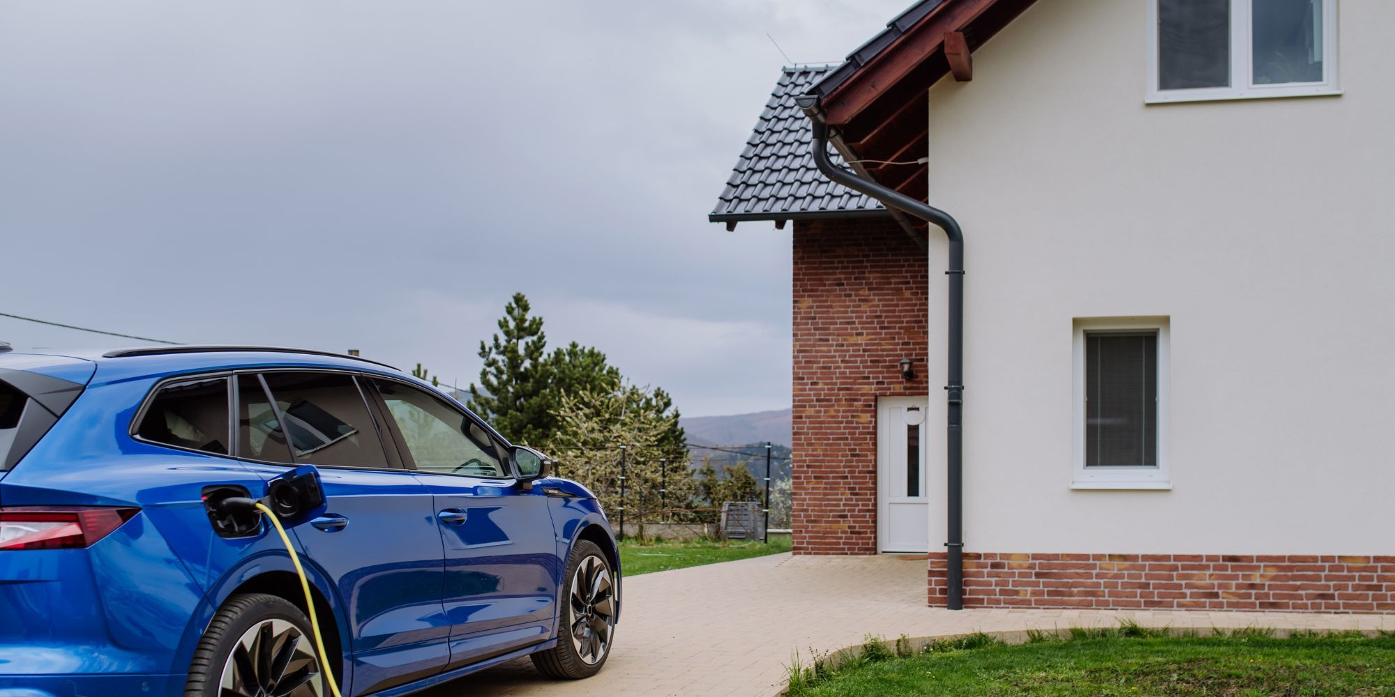 Level 2 EV charging at a residential home with charging cable connected